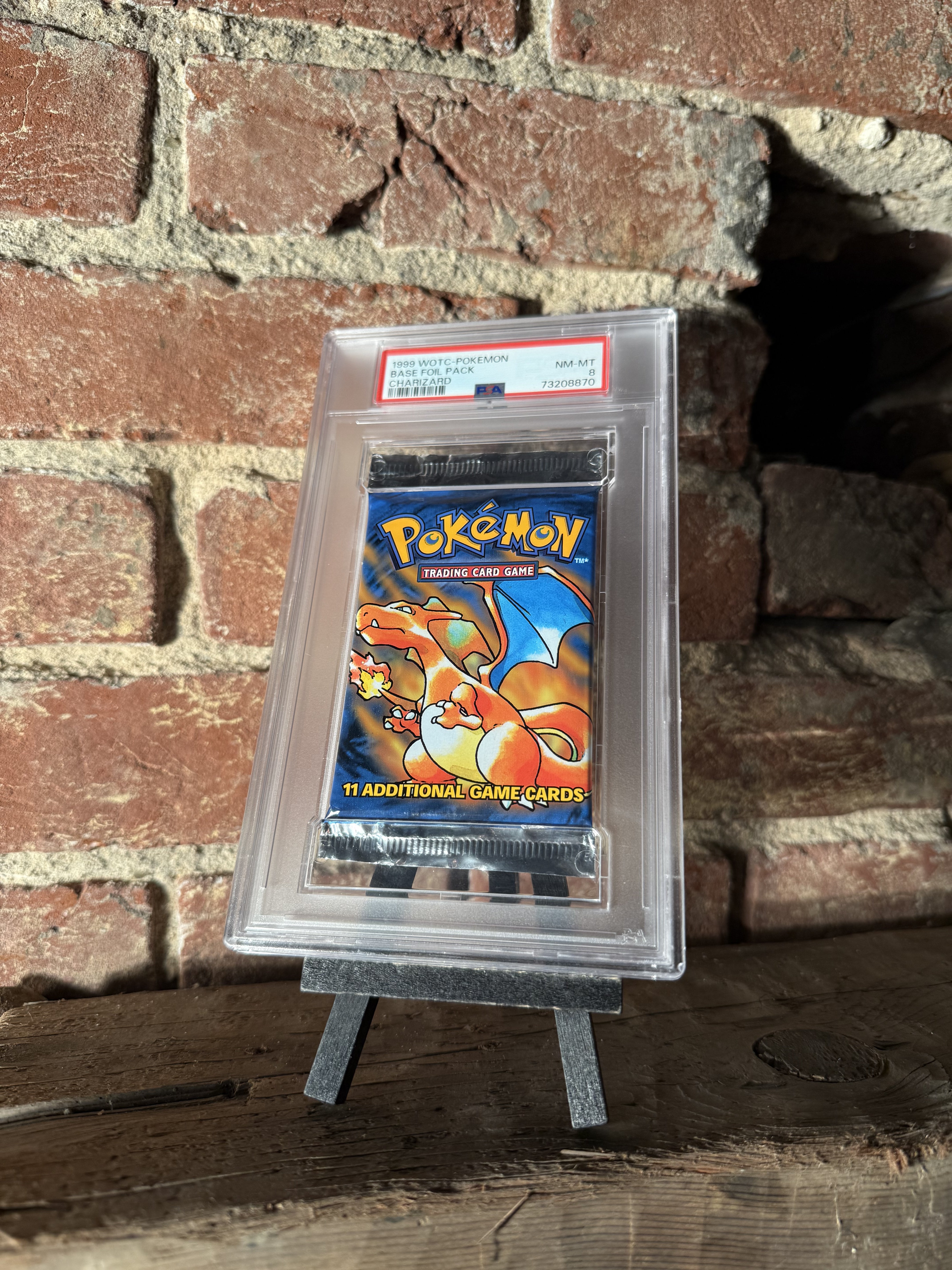 1999 WOTC-Pokemon Base Foil Pack PSA 8 Pulls & Pours 1999 WOTC-Pokemon Base Foil Pack PSA 8 Pulls & Pours